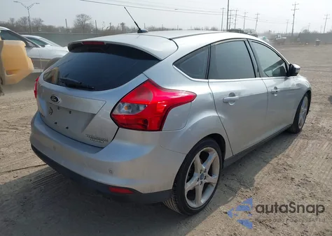 2013 Ford Focus Titanium z USA, uszkodzony, nr VIN 1FADP3N27DL220304